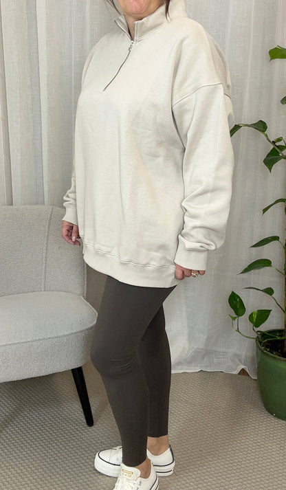 NORA HALF ZIP